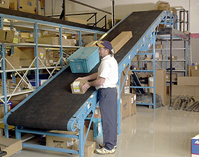 Incline conveyor and mezzanine