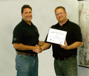 Jason Eitreim accepts Cisco-Eagle's Employee Owner of the Year Award