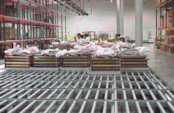 Components are staged on gravity conveyor on one of the subassembly areas