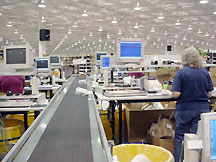 Conveyor line and pack stations in Mouser's receiving area