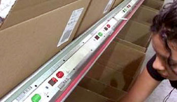 cartons presented for pack to light