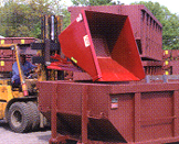Self-dumping hopper