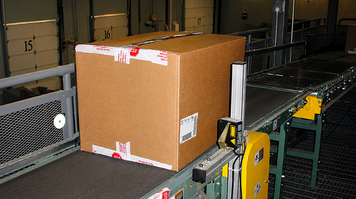 Barcode reader directs cartons on the conveyor system