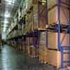large cartons in a drive-in rack system