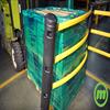 Forklift load driving into flexible rail