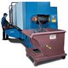 Self-dumping hopper in use at an industrial location
