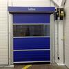 High-speed door separating building zones