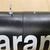 Close-up of black clearance bar showing seam where two pieces come together