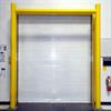 Yellow goal post style guardrail in front of white dock door