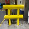 Yellow guardrail in industrial facility