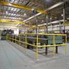 Yellow handrail around machinery