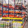 Long keg flow racks housing a number of sixer kegs.