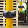 Black ring around yellow post with inset showing how ring can spin
