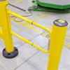 D-shaped yellow gate between two yellow posts