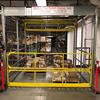 Rolled overhead mezzanine gate loaded with pallets
