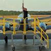 Performing maintenance using wide stance mobile work platform