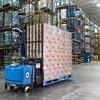 Robotic Pallet Truck with Double Length Forks Taking Product to Storage