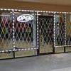 Single Gates Utilized in Storefront Windows