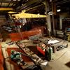 wall mounted tie rod jib crane positioning load within a work cell