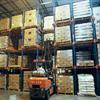 Forklift entering drive-in rack system