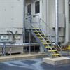 Step covers installed on a power plant stairway