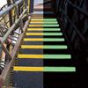 Photoluminescent step cover edges shown in light and dark conditions