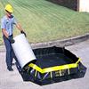 Drums can easily be rolled over the springy side walls without damage to the wall supports