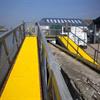Yellow walkway cover on a wooden boardwalk