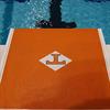 Customized traction surface with a college logo