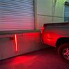 red lights at a dock door with truck backed up to it