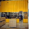 Goffs curtain wall with yellow finish utilized in a cutting operation
