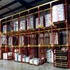 three-tier rack system with palletized bagged materials