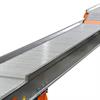 Rollers and side frame on extended conveyor