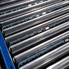 Conveyor rollers with pop-up diverts lowered