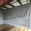 Thermal curtain used to close off mezzanine in cold storage facility