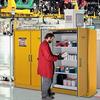 Open cabinet in use in an industrial facility