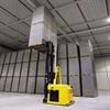 A8 driverless forklift in warehouse with raised double wide, double stacked load