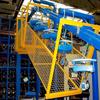 Heavy duty enclosed track conveyor used for auto parts assembly