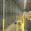 racking system with catwalk and yellow safety rails