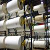 large rolls of paper on pallet rack