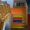 Residential staircase with step covers in a variety of colors