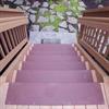 Brown step covers on a residential stairway