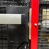 Door of wire cage with pushbar and electric strike