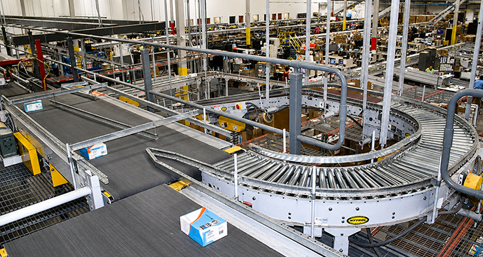 conveyor system atop the sortation mezzanine