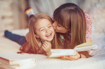 mom and daughter reading