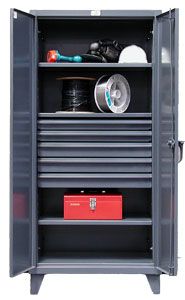 Open cabinet with drawers, coils and a toolbox