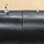 Close-up of black clearance bar showing seam where two pieces come together