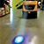 As vehicle approaches, the bright light precedes it, warning pedestrians and other traffic of an oncoming vehicle