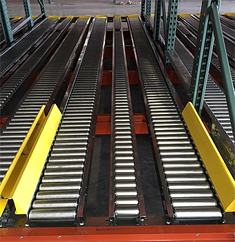 Pallet rack with split rollers installed.