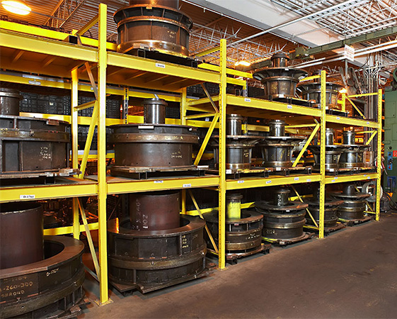 heavy duty die storage rack anchored to a concrete warehouse floor.